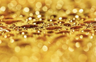 Yumuşak altın arka plan boş ışıltılı, kopyalama alanı