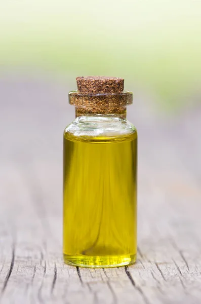 Essential herb oil in a small bottle