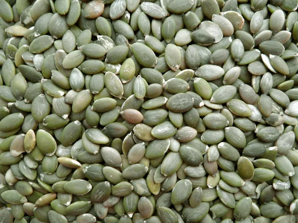 Pumpkin seeds background — Stock Photo, Image