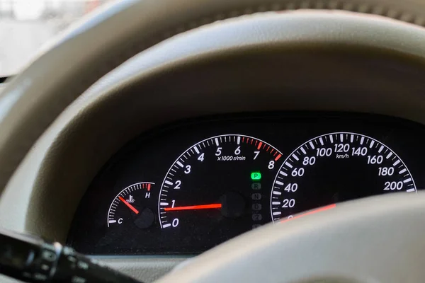 Modern Car Dashboard. Car Driving. Vehicle Steering Wheel and Dashboard.