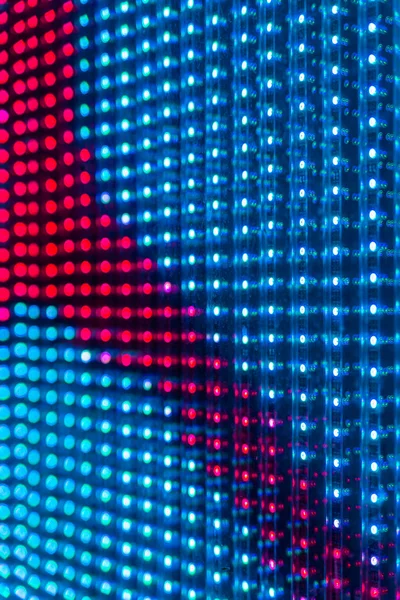 Abstract blue and red LED light wall background. Night illumination