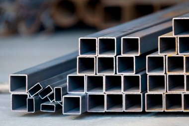 Yüksek karbon metal tüp arka plan ağır sanayi için kare.