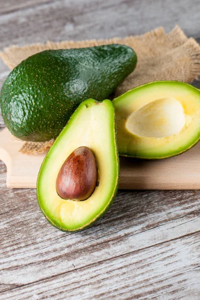 Close Avocado Avocado Oil Wooden Table Healthy Food Concept — Stock Photo, Image