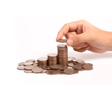 Bir elinde büyüyen para sikke yığını