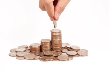 Bir elinde büyüyen para sikke yığını