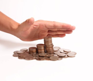 Bir elinde büyüyen para sikke yığını