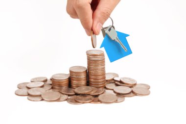 Bir el ve Model ev iş büyüyen para sikke yığını