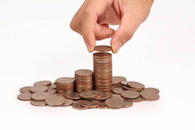 Bir elinde büyüyen para sikke yığını