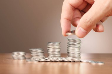 el koyarak sikke yığını