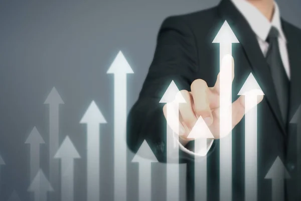 Businessman  Touching stock Graph Indicating Growth — Stock Photo, Image