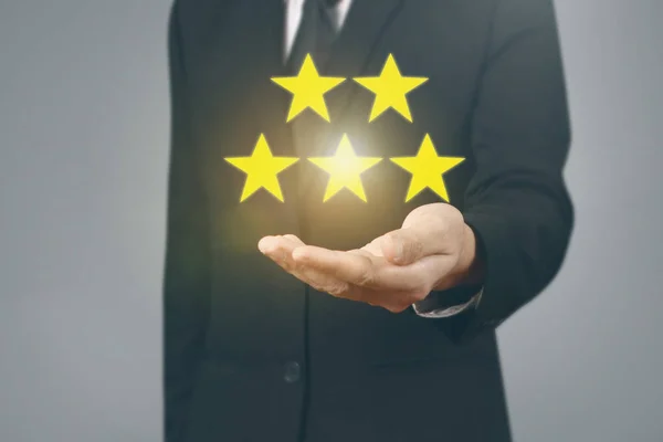 Hand röra Five Star symbol för att öka betyg — Stockfoto