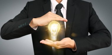 Işıklı ampul tutma eli, yenilik ilham c