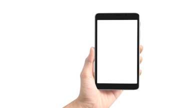 Bir tablet tutan eller izole edilmiş bilgisayar aygıtlarına dokunur 