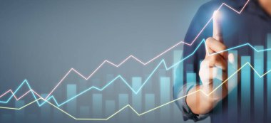 İşadamı, işinde grafik büyümesi ve grafik artışı için olumlu göstergeler planlıyor