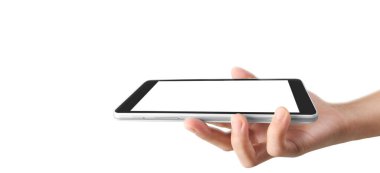 Bir tablet tutan eller izole ekran ile bilgisayar aygıtına dokunur