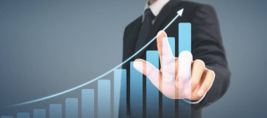 İşadamı grafik büyümesi ve grafik pozitif göstergelerin artması planı