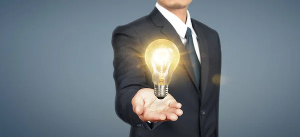 Hand Holding Illuminated Light Bulb Idea Innovation Inspiration Concept — Stock Photo, Image