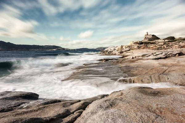 Long Exposure Image Waves Washing Rocks Coast Genoese Tower Punta — Stock Photo, Image