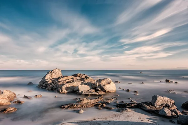 Long Exposure Image Mediterranean Sea Washing Rocks Sandy Beach Sunrise — Stock Photo, Image