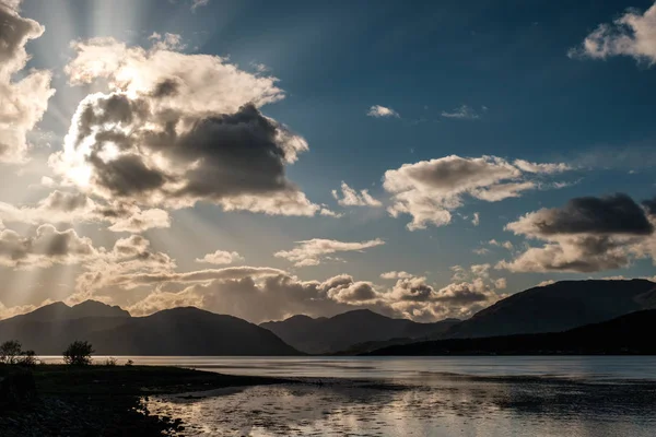 Sun rays filtering through clouds over Loch Linnhe in Scotland — Stock Photo, Image