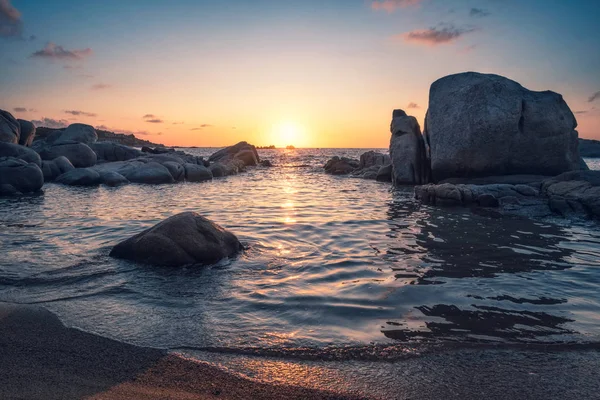 Sunrise over boulders at Cavallo Island in Corsica — Stock Photo, Image