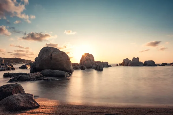 Sunrise over boulders at Cavallo Island in Corsica — Stock Photo, Image