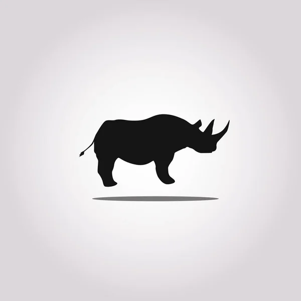 Ilustração vetorial de uma silhueta de um rinoceronte sobre fundo branco isolado. Perfil de Rhinoceros vista lateral . — Vetor de Stock