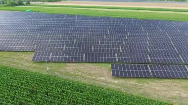 Sunlight-powered photovoltaic station on grass
