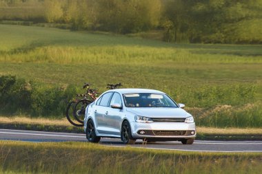 Outdoor journey with rear bike rack loaded for travel
