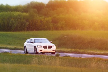 Luxury muscle vehicle on peaceful highway