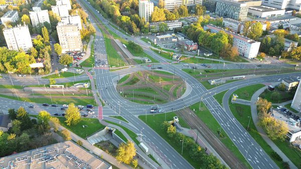 Residential neighborhood with roundabout in fall light