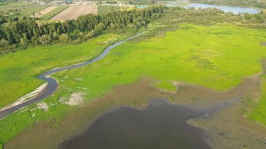 Calm rural scenery with winding river flow