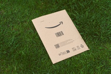 Amazon mail parcel in spring field 05.05.2025 Poland Europe