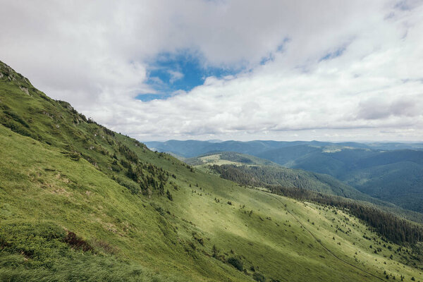 A sign on the side of a mountain