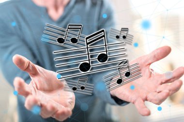 Müzik konsepti içinde geçmiş bir adamın elleri yukarıda