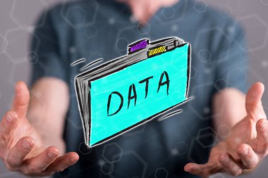 Arka plandaki bir adamın elleri arasındaki veri kavramı