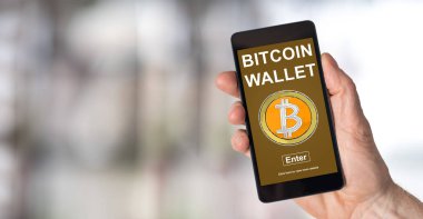 Bitcoin cüzdan kavramı görüntüleyen akıllı telefon ekranı