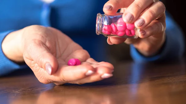 Close Female Hands Taking Medication — Stock Photo, Image