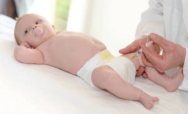 Little Baby Getting Vaccine Shot Leg Royalty Free Stock Images