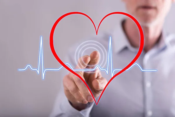 Człowiek Dotykając Serce Bije Wykres Ekranie Dotykowym Palcem — Zdjęcie stockowe