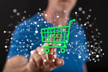 Adam dokunmatik ekranda bir e-ticaret konseptine parmağıyla dokunuyor.