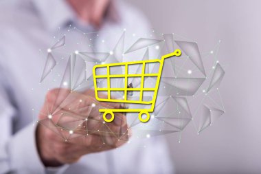 Dokunmatik ekranda kalemle bir e-ticaret konseptine dokunan adam