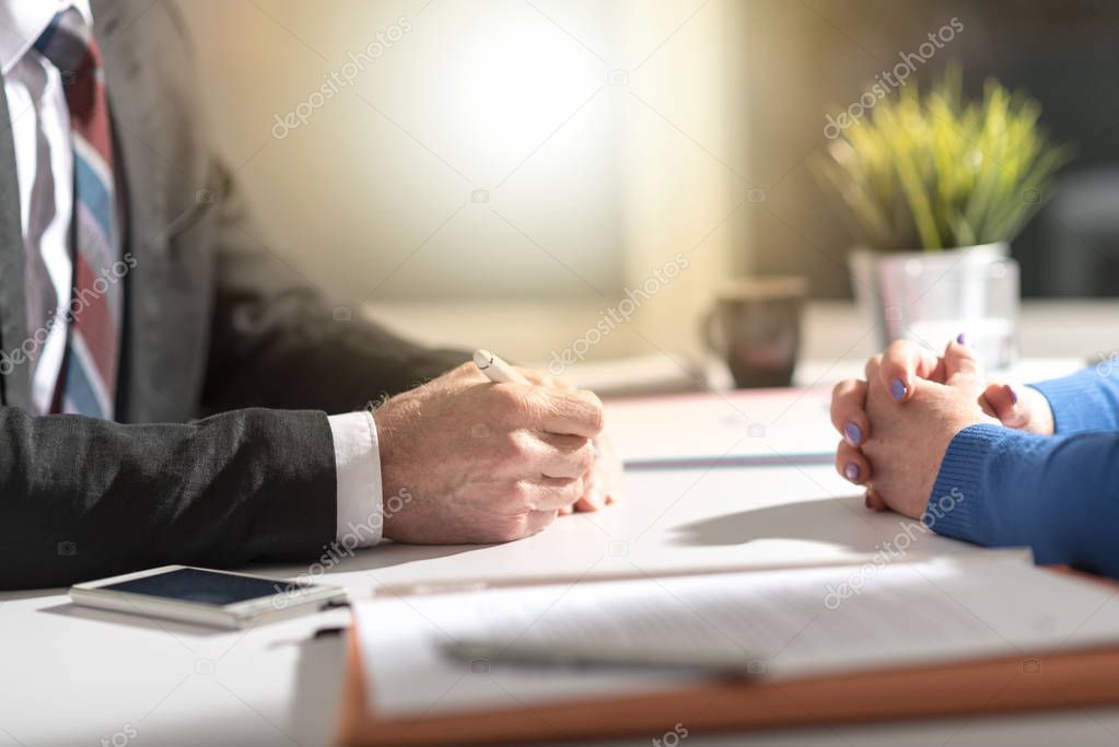 Situation of business negotiation between businesswoman and businessman, light effect