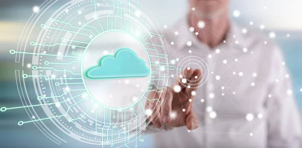 Man touching a cloud computing system concept on a touch screen with his finger