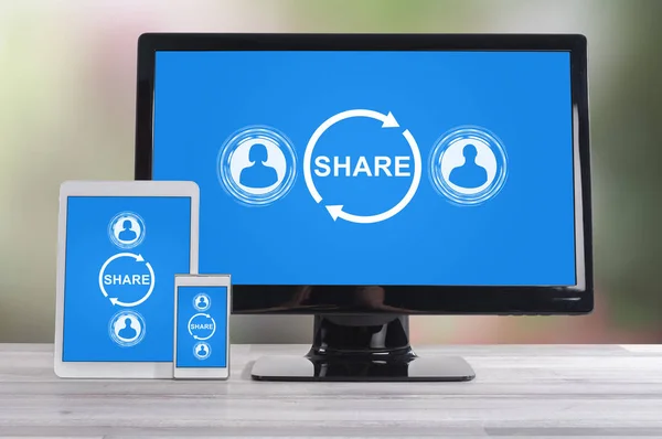 Share concept shown on different information technology devices