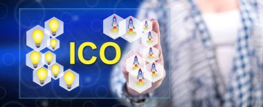 Kadın bir ICO kavramı onun parmak dokunmatik ekranlı cep bilgisayarlarda dokunmadan