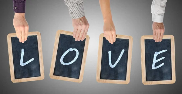 Liter Słowa Miłość Pisemnej Chalkboards Posiadanych Przez Ręce — Zdjęcie stockowe