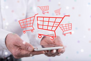 Akıllı bir telefonun üstündeki alışveriş konsepti.