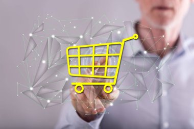 Adam dokunmatik ekranda bir e-ticaret konseptine parmağıyla dokunuyor.