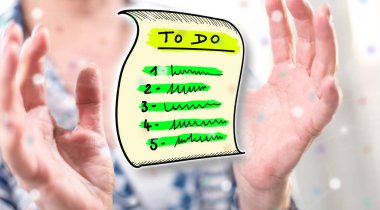 Arka planda bir kadının elleri arasındaki liste konseptini yapmak için